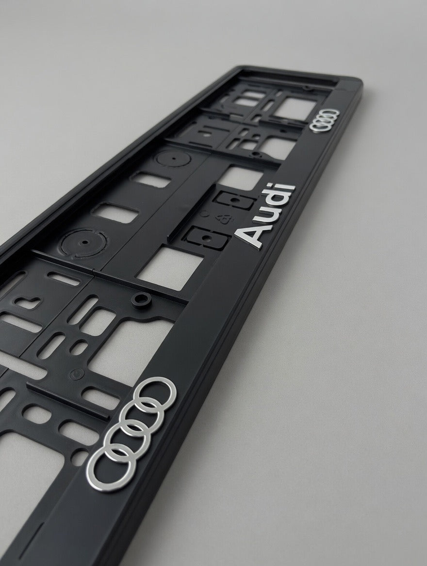 Portamatrículas Audi | A3, A4, A6, Q3, Q5 | Logo y Letras 3D Cromadas