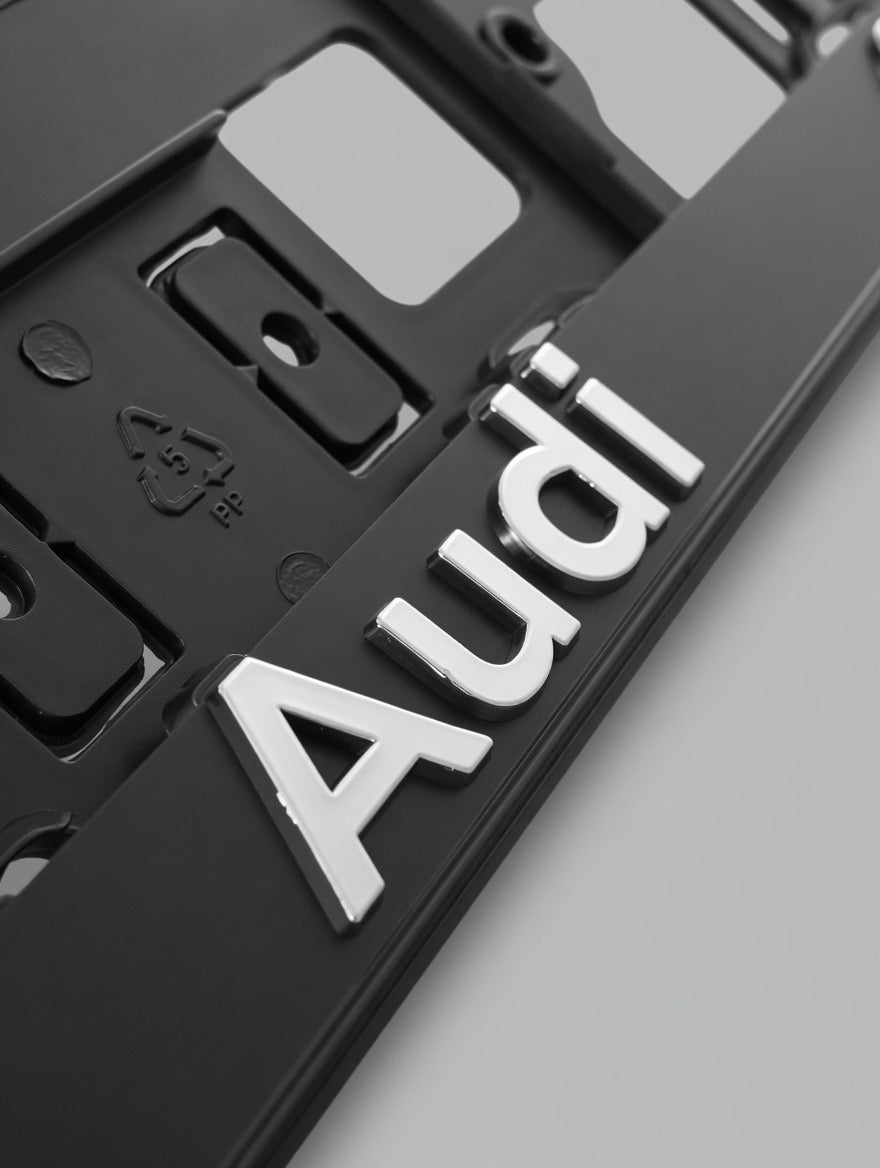 Portamatrículas Audi | A3, A4, A6, Q3, Q5 | Logo y Letras 3D Cromadas